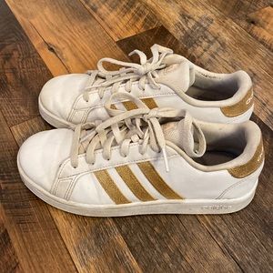 Adidas white and gold tennis shoes size 4